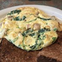 House Omelette · Vegetarian omelette with fresh spinach, mushrooms, onion, and feta cheese.