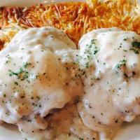 Country Benedict · Country sausage and two soft poached eggs on a English muffin, topped with country sausage g...