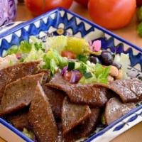 Beef & Lamb Gyro Salad · Greek salad served with beef and lamb Gyro