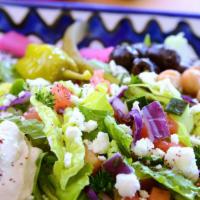 Greek Salad · Romaine, tomato, cucumber, pickle, pepperoncini, olives, onion, feta
