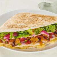 Macha Quesadilla Wrap · Choice of protein, melted cheese, salsa, crema, shredded romaine, and pickled red onions wra...
