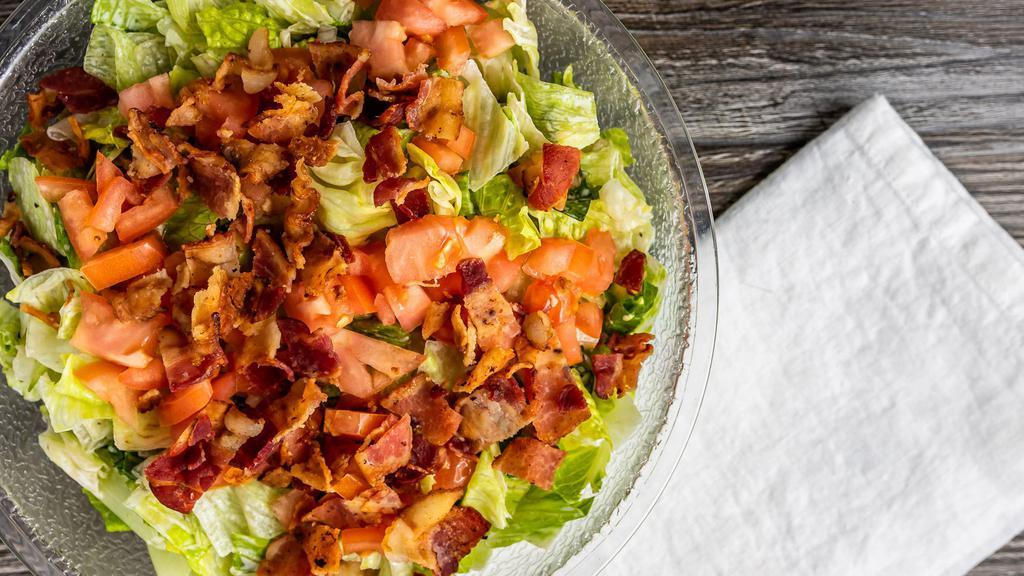 Blt Salad · Diced tomatoes and chopped bacon tossed in a creamy garlic ranch dressing.