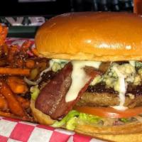Bleu Burger · With creamy bleu cheese dressing, smoked bacon, lettuce, tomato, red onions and bleu cheese ...