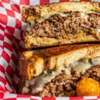 Patty Melt · Melted swiss cheese, caramelized onions with garlic aioli on marble rye bread.