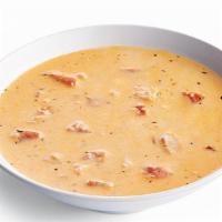 Lobster Bisque · Lobster, Fennel, Roma Tomatoes, Carrots, Onions, Celery, Herbs & Spices In A Creamy Broth.