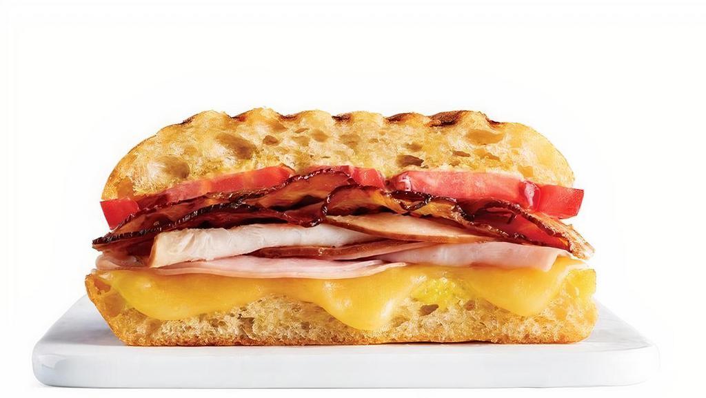 Honey Bacon Club · Turkey, Ham, Applewood-Smoked Bacon, Tomatoes & Muenster Cheese with Honey Mustard Spread