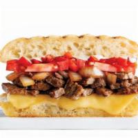 Steak & Cheese · Marinated Steak, Caramelized Onions, Tomatoes, Roasted Red Peppers & Muenster Cheese with Bi...
