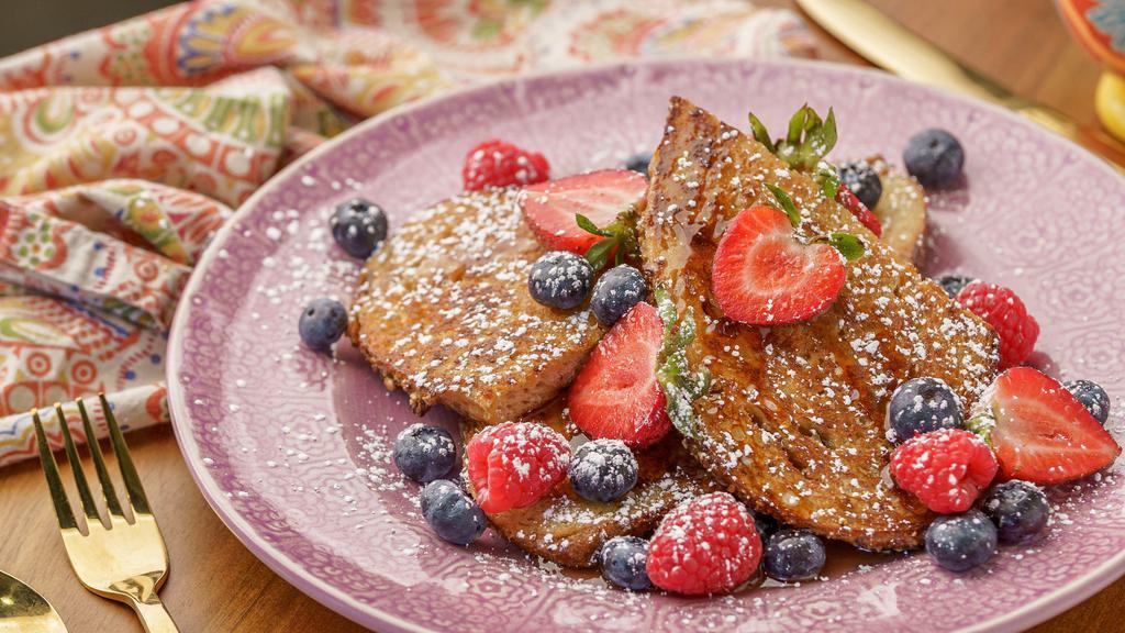 French Toast · Strawberry, blueberry, maple syrup, homemade whipped cream