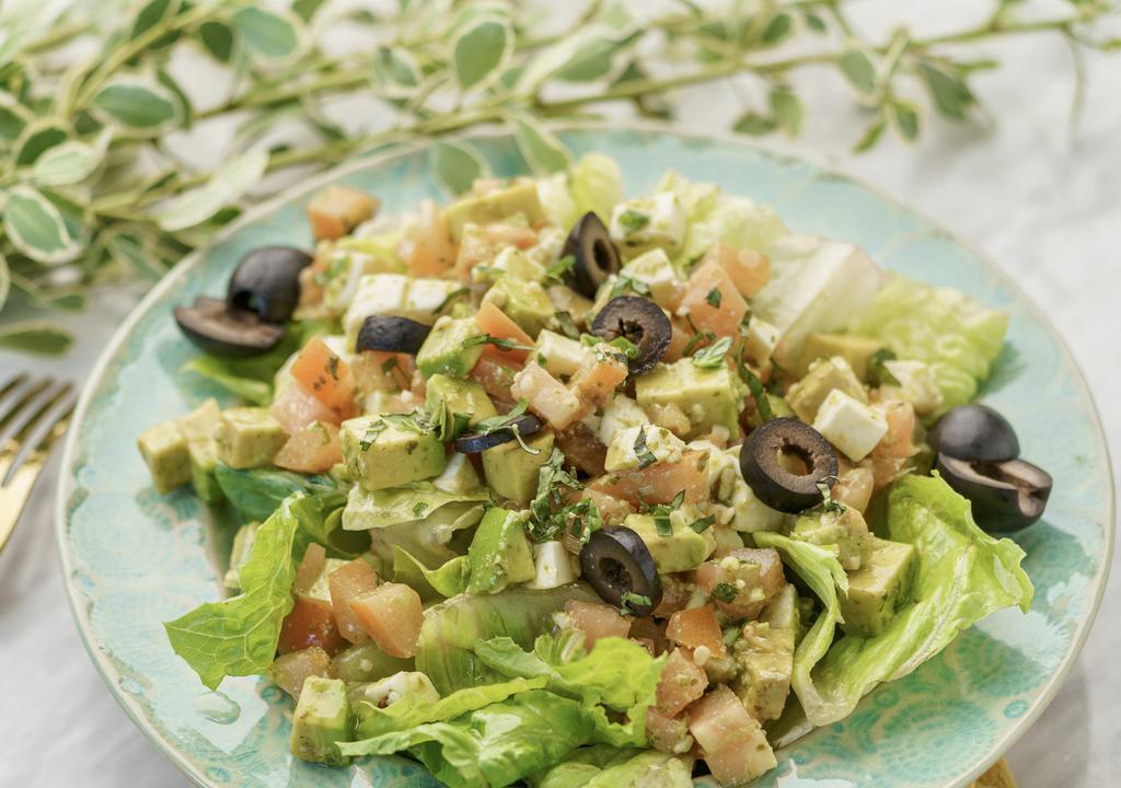 Tomato Mozzarella Salad · Romaine lettuce, tomato mozzarella, basil leaves, black olive, avocado, pesto balsamic vinaigrette