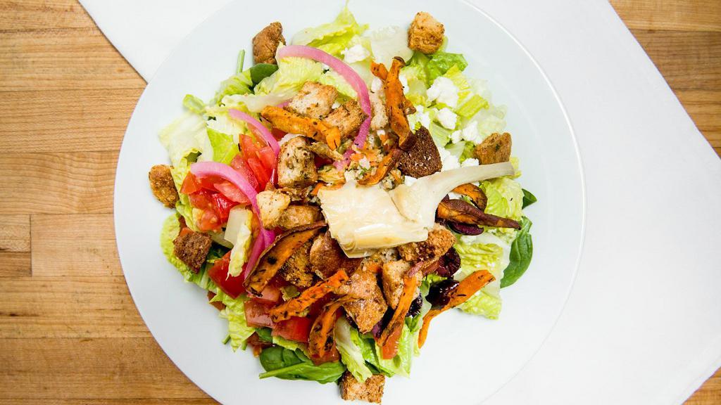 Mediterranean Chop Salad · Feta, tomato, kalamata olives, marinated red onion, artichokes,hummus, croutons with a tzatziki dressing over mixed greens and romaine.