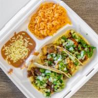 Three  Street Taco Platter  · Corn or flour tortilla. Cilantro,Onion
Rice and beans