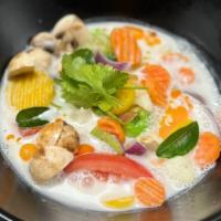 Tom Kha  · Thai coconut soup, cabbage, mushrooms, galangal, lemongrass, kaffir lime leaves, tomato, red...