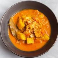 Yellow Curry · Yellow curry paste, coconut milk, potato, onion, carrots, fried shallots.