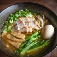 Tonkotsu Shoyu · Rich pork broth, pork chashu, wavy noodle, egg.