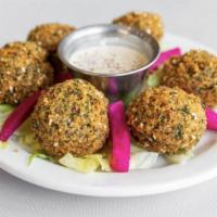 Falafel* · Six pieces veggie burgers (made of chick peas and authentic middle Eastern spices).