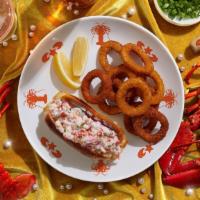 Garlic Lobster Roll Combo · Fresh lobster tossed with creamy mayo, chopped garlic, fresh chives, and lemon on a toasted ...