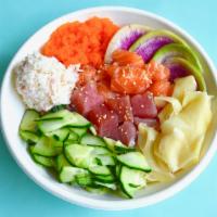 Rainbow Roll Bowl · Ahi tuna, salmon, cucumber, citrus ponzu, crab salad, ginger, masago, and sesame seeds.