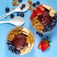 The Nuts · Organic Acai topped with Organic Granola, Fresh Strawberries and Bananas,  Peanut Butter, Ho...