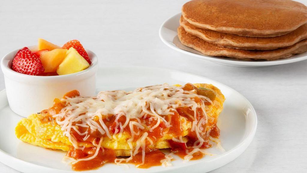 Garden Veggie Omelette* · Low-cholesterol egg substitute, onions, green peppers, tomatoes and mushrooms. Topped with Ranchero sauce and Mozzarella cheese.