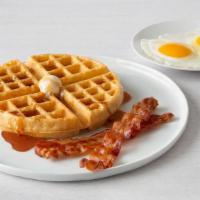 Belgian Waffle Combo · Two eggs, any style, and a Belgian waffle with two bacon strips or two sausage links..