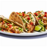 Baja Fish Tacos Grilled · Grilled cod served on soft tortillas with pico de gallo, cabbage and house spicy sauce. 890 ...