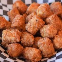 Tater Tots · Enjoy grated potatoes formed into small cylinders and deep-fried to a golden brown perfectio...
