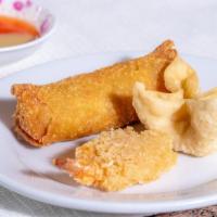 Triple Appetizers · Egg roll, Crabmeat cheese won ton and fried shrimp.
