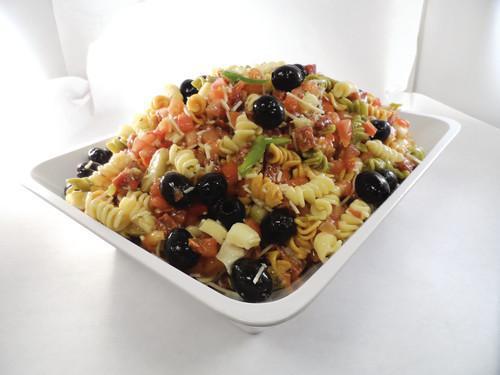 Antipasto Salad (1 Lb.) · Tri color rotini pasta, Genoa Salami, Provolone, tomatoes, black olives, Artichoke hearts and parmesan in a Milanese Vinaigrette.