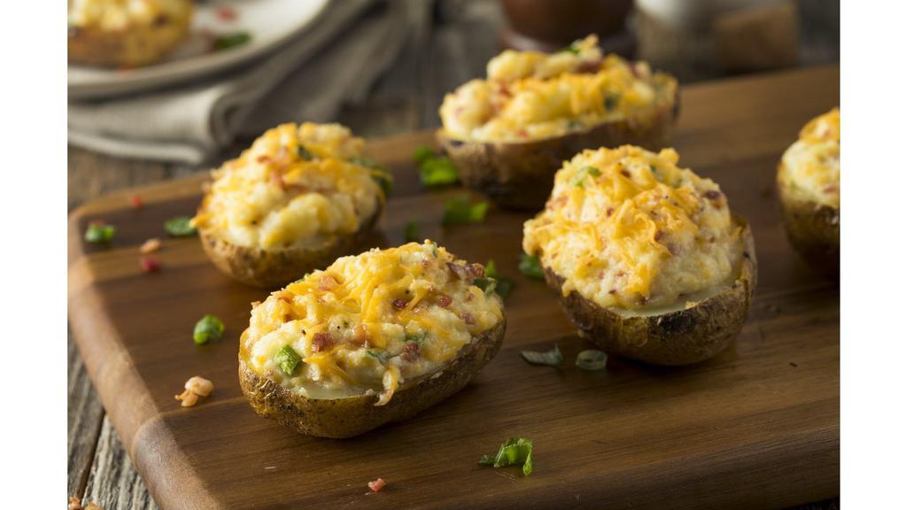 Twice Baked Potato · Potato filled with creamy potatoes mixed with Bacon and Cheddar Cheese.