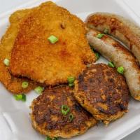 Sampler Plate · Includes 2 Schnitzels, 2 Sausages (choice), 2 Frikadelles, Sauerkraut, Spaetzle, Red Cabbage...