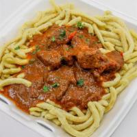 Gulasch · Chopped beef with fresh house speatzle (German noodle)  and the signature bell pepper gravy.