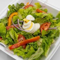 Mixed Salad · Mixed greens, sunflower seeds, tomatoes, red and green peppers, onion, egg and cucumber.