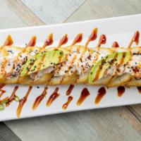 Guamuchilito Roll · Sushi roll with surimi, cream cheese and avocado topped with our delicious prepared surimi, ...