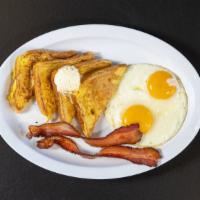French Toast  · TWO EGGS ANY STYLE WITH CHOICE OF BACON, HAM, SAUSAGE OR NO MEAT