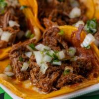 Queso Taco Birria (Harina) · MELTED CHEESE WITH MEAT ONION AND CILANTRO
