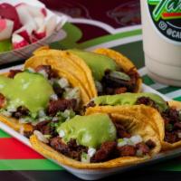Tacos · Tacos come with guacamole, onion and cilantro.