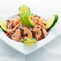 Botana Mixta · Lime Cooked Shrimp Ceviche, Octopus,
Cooked Shrimp, Imitation Crab, and Clamato