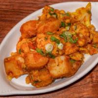 Aloo Gobhi · Cauliflower and potatoes sauteed with tomatoes, onions, and spices. V-GF-NF