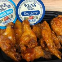 Bone-In Buffalo Chicken Wings (12Ct) · Bone-in wings tossed in sweet and spicy buffalo sauce.