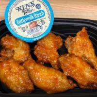 Bone-In Buffalo Chicken Wings (6Ct) · Bone-in wings tossed in sweet and spicy buffalo sauce.