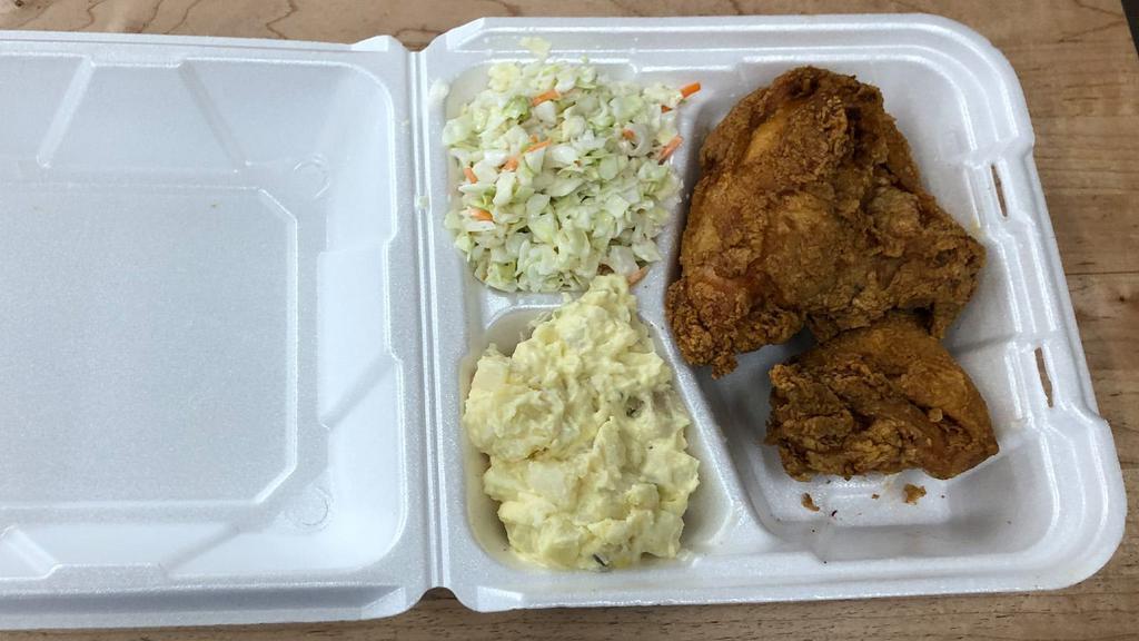 Chicken Combo Meal #4 · Fried chicken breast and wing with cole slaw and potato salad.