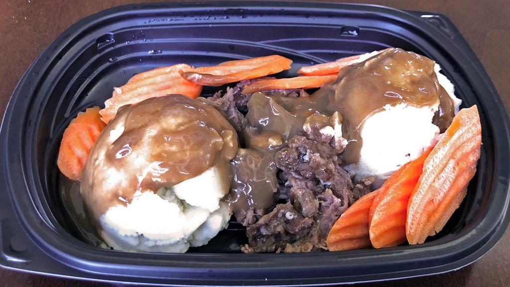 Pot Roast Meal · Tender beef pot roast and mashed potatoes with brown gravy and fresh carrots.