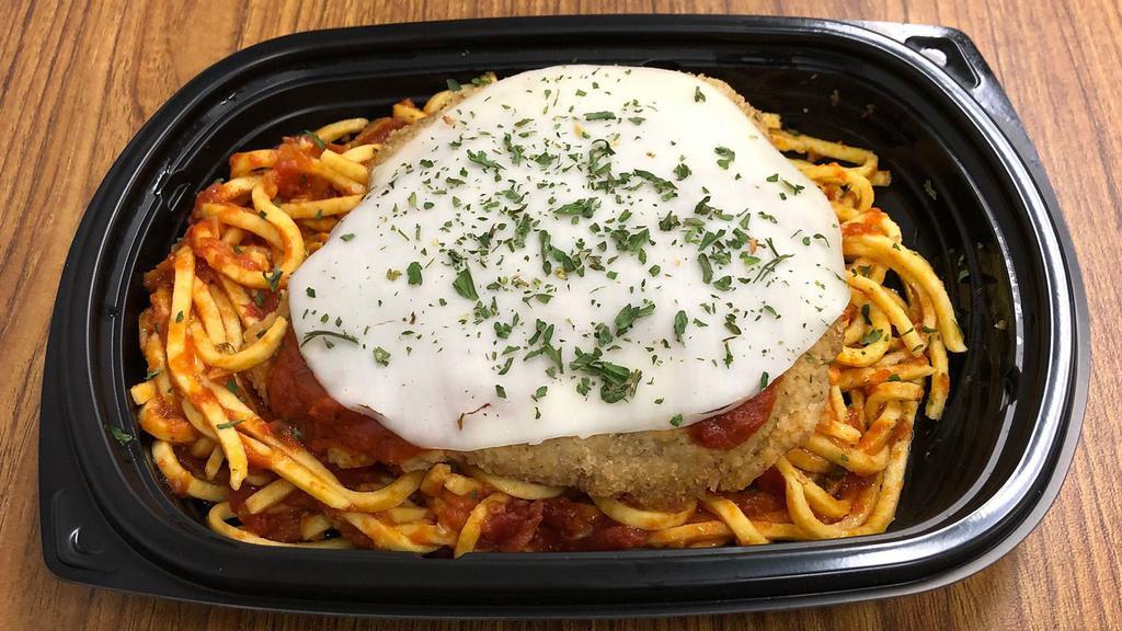 Chicken Parmesan Meal · Italian breaded chicken breast topped with provolone cheese on a bed on linguinie in roasted tomato sauce.