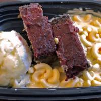 Meatloaf, Mac & Cheese Meal · Beef meatloaf with mashed potatoes, gravy, and creamy macaroni and cheese.
