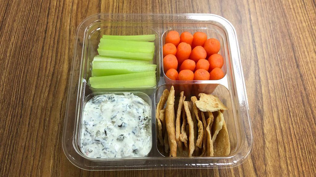 Deli Snack Spinach Dip · Spinach dip, baby carrots, celery, and Stacy's pita chips.