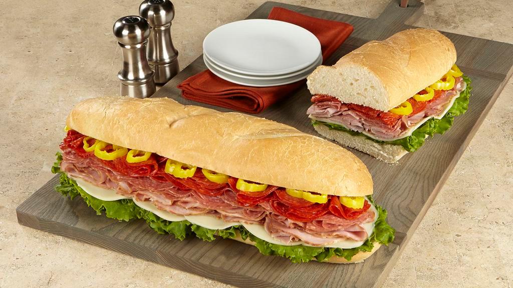 Italian Super Sub Sandwich · Honey ham, hard salami, pepperoni, provolone, pepperoncini, and leaf lettuce on French bread - no  substitutions.