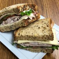 Cranberry Turkey · Store roasted turkey, havarti cheese, red onion, lettuce, tomato with a cranberry mayo dress...