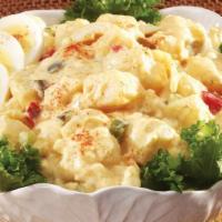 Deviled Egg Potato Salad · Tender potatoes and hard boiled eggs, in a creamy salad dressing.