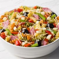 Antipasto Salad · Tri color rotini pasta, Genoa salami, provolone, tomatoes, black olives, artichoke hearts, a...