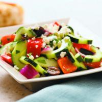 Greek Salad · Fresh cucumbers, tomatoes, red onion, red bell pepper, olives, and feta tossed with a Greek ...